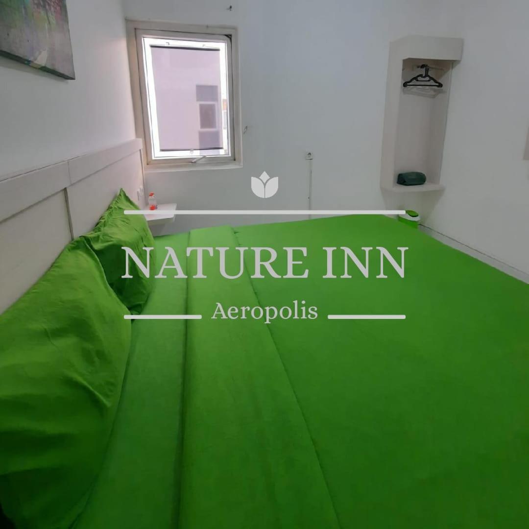 Nature Inn Aeropolis Ar3 Tangerang Buitenkant foto