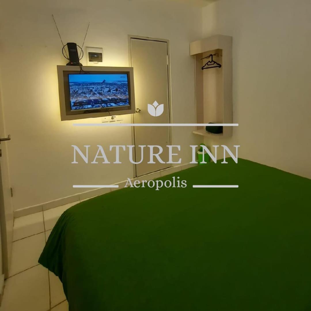 Nature Inn Aeropolis Ar3 Tangerang Buitenkant foto