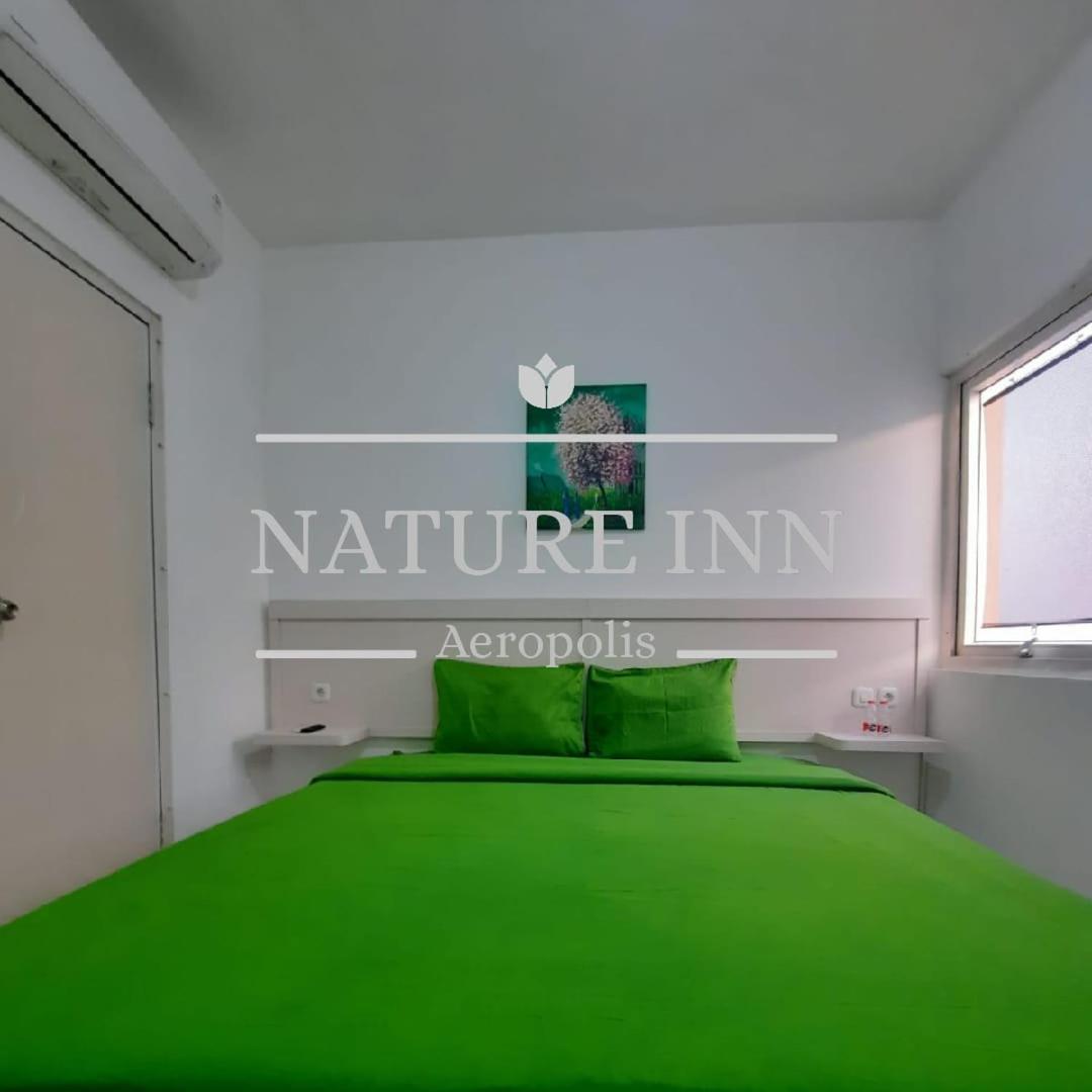 Nature Inn Aeropolis Ar3 Tangerang Buitenkant foto